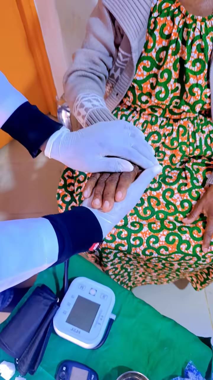 CareBridge caregiver providing gentle support to an older client